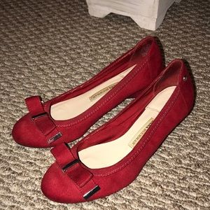 Ruby red bow slippers by Dana Buchman